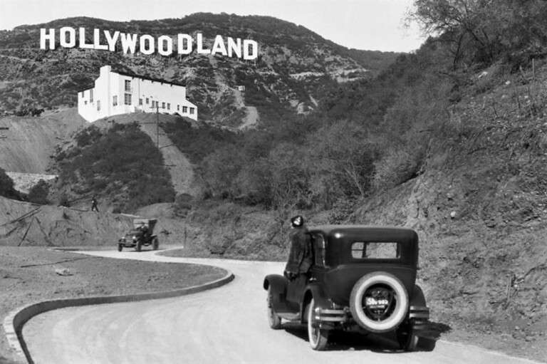 bf90695c-36a4-435e-b587-53b393032965-Slide0X-Car-Driving-Towards-Hollywoodland