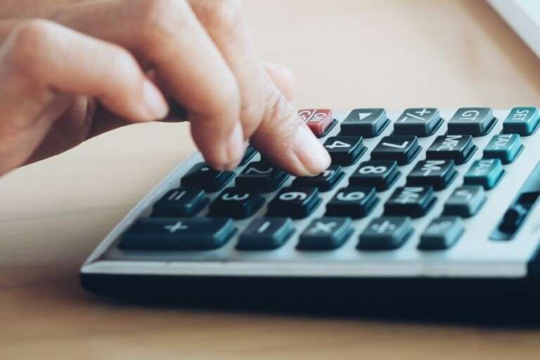 finances-saving-economy-concept-female-accountant-banker-use-calculator.91db79