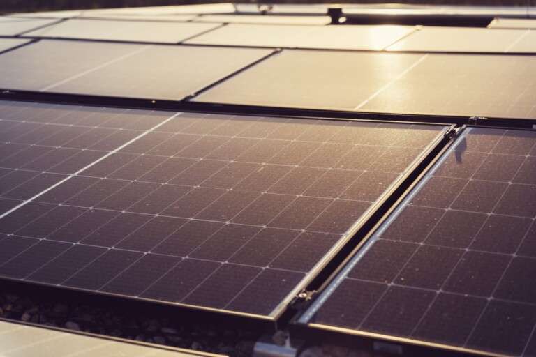 detailed-view-of-solar-panels-capturing-sunlight-highlightin-18306344