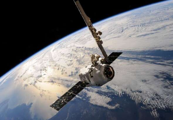 a-satellite-glides-over-earth-showcasing-dramatic-cloud-form-586056